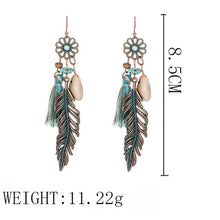 Load image into Gallery viewer, Fashion Hollow Carved Alloy Tassel Earrings
