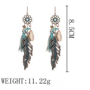 Fashion Hollow Carved Alloy Tassel Earrings